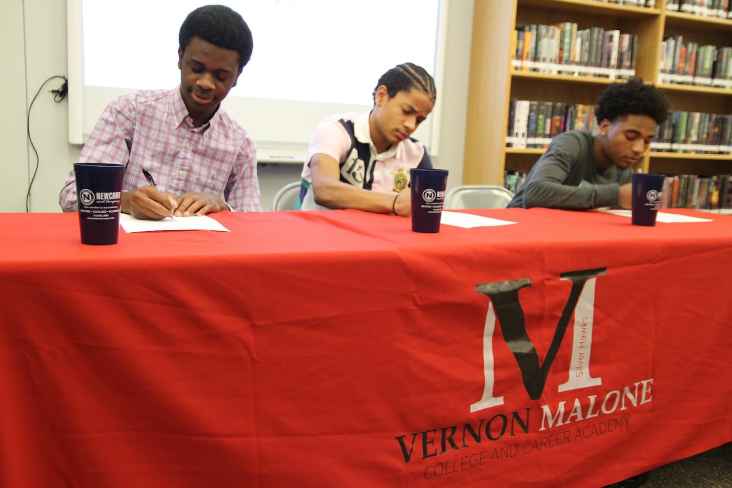 Jaylen Browder, Hugh Hines and Zamien Williams sign with Newcomb & Company. 